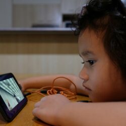 girl using black android smartphone