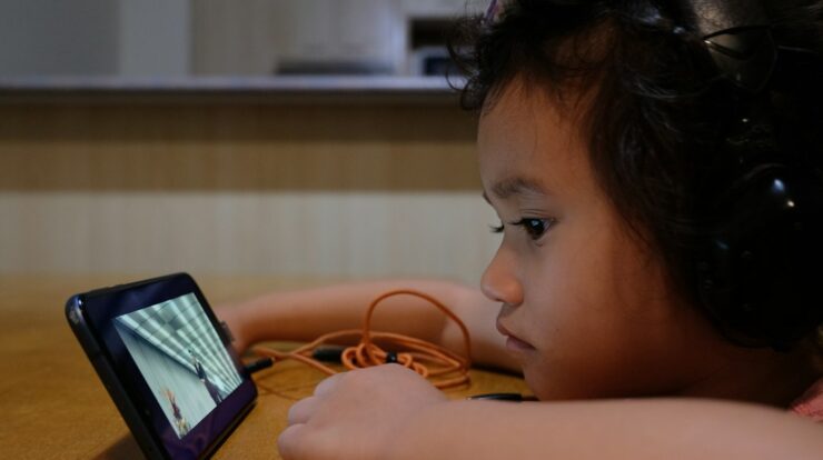 girl using black android smartphone