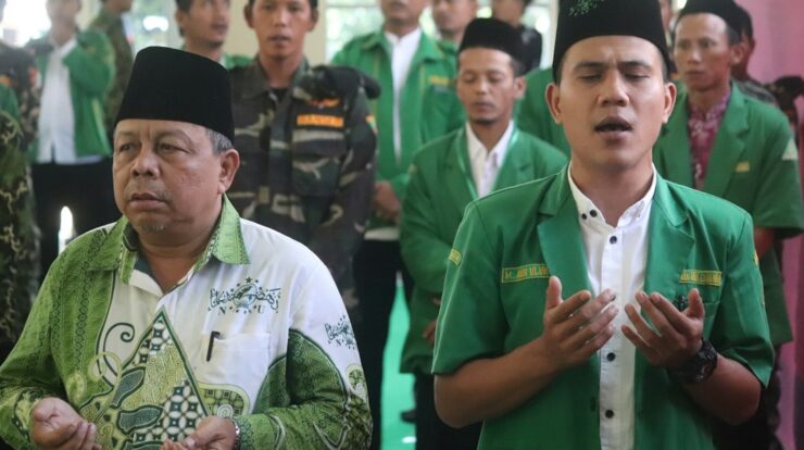 man in green and white polo shirt