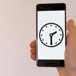 person holding black android smartphone