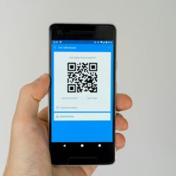 black android smartphone displaying qr code