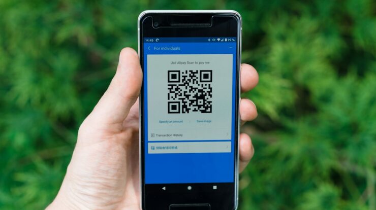 black samsung android smartphone displaying qr code