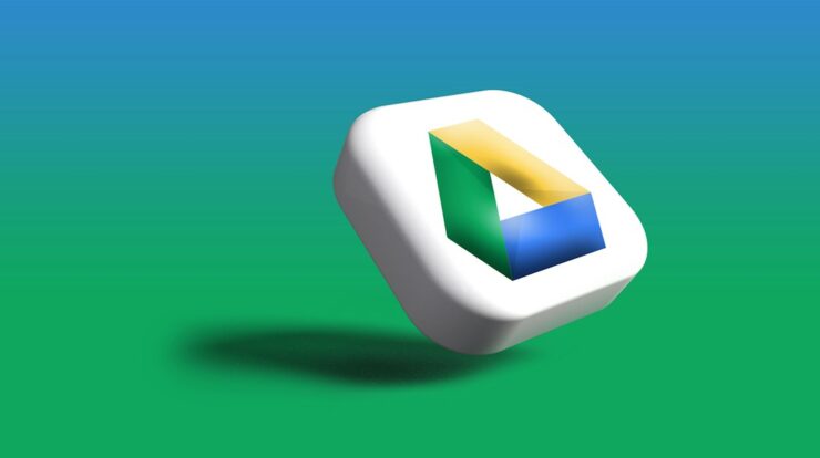 a close up of a white object on a green background