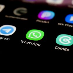 a close up of a cell phone with whatsapp on the screen