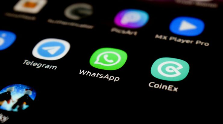 a close up of a cell phone with whatsapp on the screen