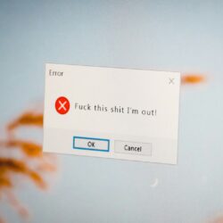 a close up of a computer screen with a sign on it