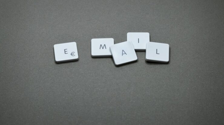 The word "email" is spelled out with letter tiles