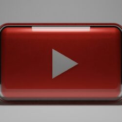 a red play button with a white arrow