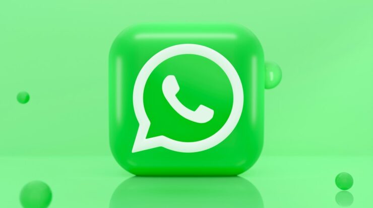 A green 3D icon of a telephone handset inside a speech bubble