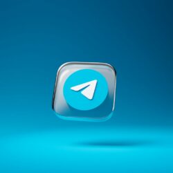 a blue button with a white arrow on it