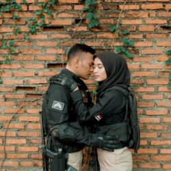 a man and woman kissing