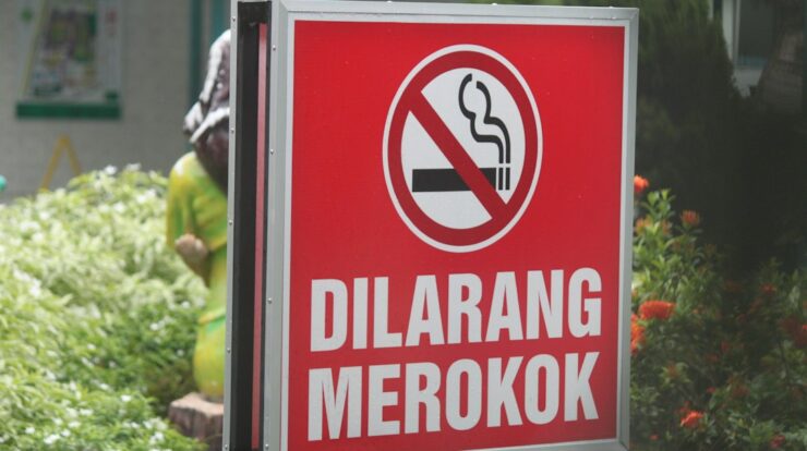 red and white no smoking sign