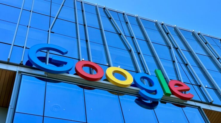 the google logo is displayed on the side of a building