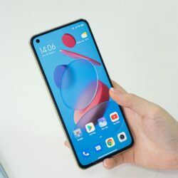 person holding iphone 6 with blue and red iphone case
