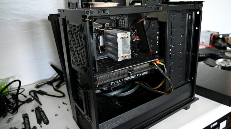 black computer tower on white table