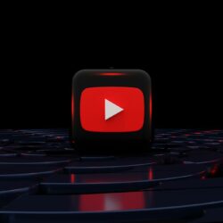 a red play button on a black background