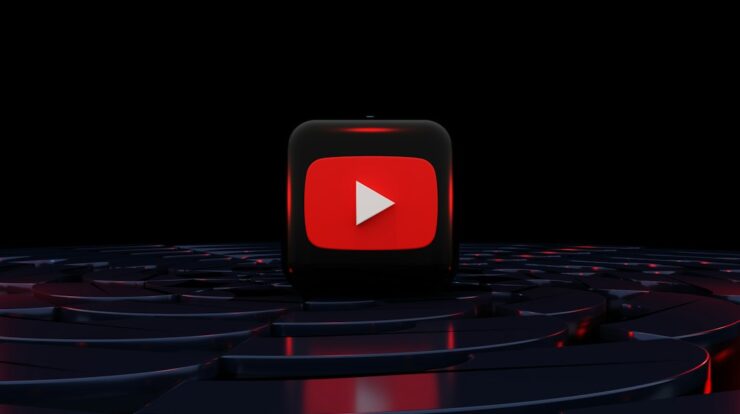 a red play button on a black background