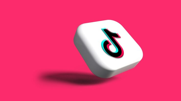 a white dice with a black number on it